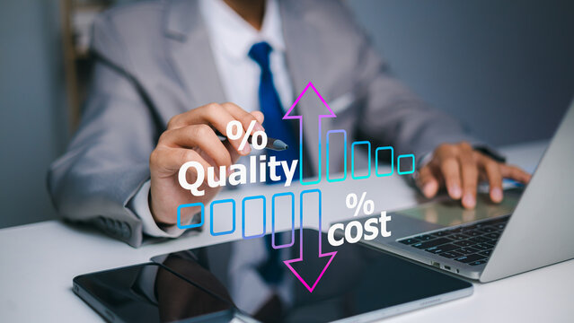 Businessman analyzing quality improvement and cost reduction balance on virtual screen.