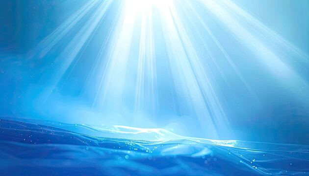 Rays of light streaming down into clear blue water.