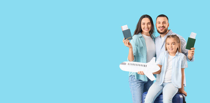 Family of travelers with passports and paper airplane on blue background