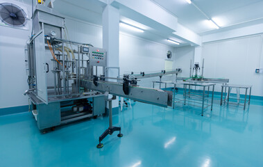 Fototapeta premium Clean industrial food processing room stainless steel conveyor machine sanitary production equipment automation modern factory interior designed packaging manufacturing operations technology quality.