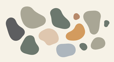 Fototapeta premium Abstract organic pebble shapes on cream background.