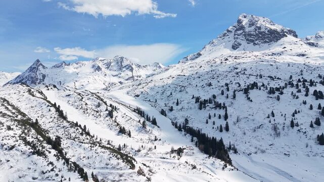 Snowy Mountain Landscape At Silvapark Ski Resort In Galtur, Austria. drone pullback shot