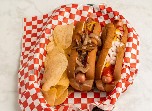 hot dogs with onions, ketch up and mustard