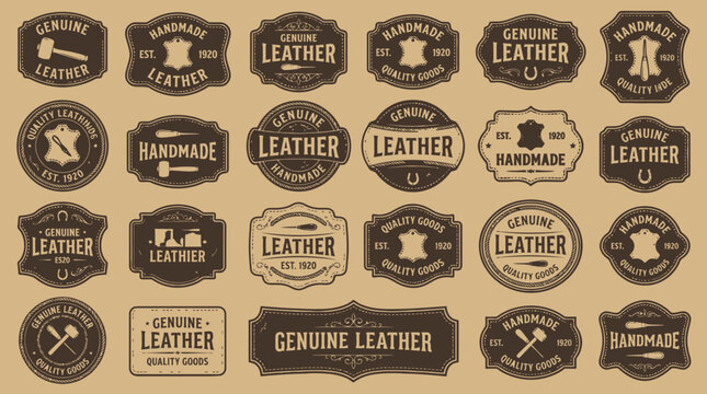 Various leather labels and stamps are arranged on a surface.