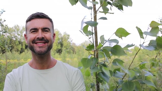 Landowner smiling next to Poplar Tree on His Plantation 