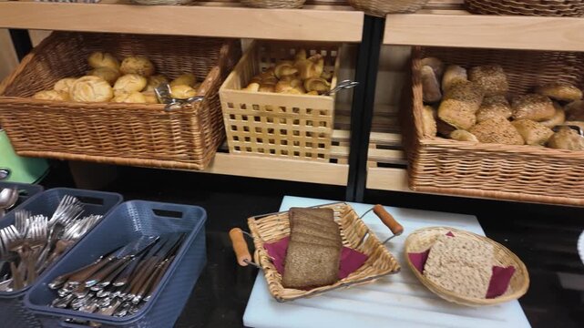 Fresh bread and buns assortment at hotel breakfast buffet