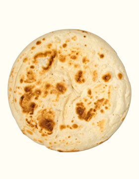 Single Round Flat Baked Jamaican Cassava Bammy Bread Beautifully Isolated on a White Background