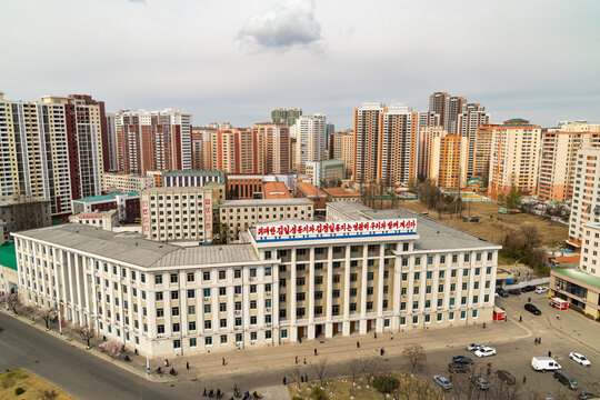 Pyongyang, North Korea - 04 06 2026: State Planning Commission building. Cabinet-level government organization. View from Arch of Triumph, Pyongyang. Socialist architecture.
