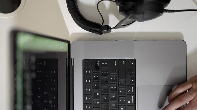 Flat lay desk view, laptop, phone, keys, headphones, work from home, coffee