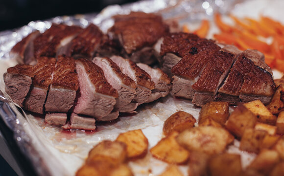 baked duck with potatoes and butter