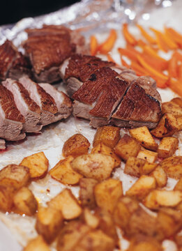 baked duck with potatoes and butter