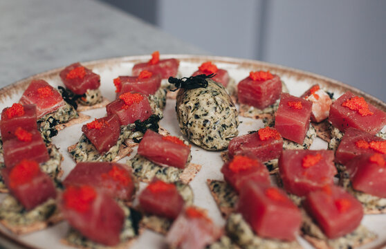 canap&eacute;s on a plate with tuna