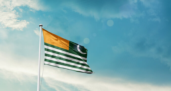 Kashmir national flag fluttering. The flag blowing in beautiful soft sky. 5th febuary Kashmir national flag for solidarity day.