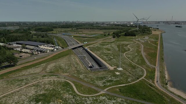 The northern entrance of the Blankenburg Tunnel near Vlaardingen and Maassluis in the Netherlands. The city of The Hague is visible in the distance.