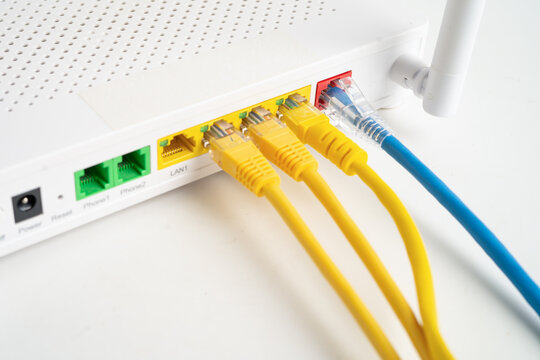 Ethernet cable with wireless router connect to internet service provider network.