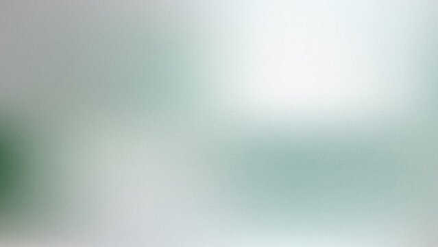 Abstract blurred background with soft light and grainy texture in shades of green and grey