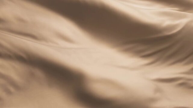 Soft beige fabric folds close up for elegant textile background