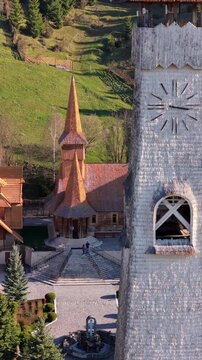 Aerial drone view of the Monastery Acoperamantul Maicii Domnului in Dorna Arini, Suceava County, Romania. Vertical