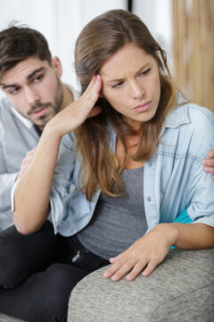 man trying to cajole girlfriend after an argument