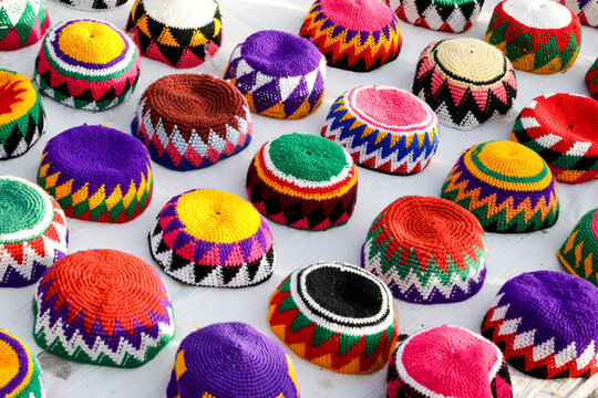 Colorful embroidered caps displayed in an Egyptian market