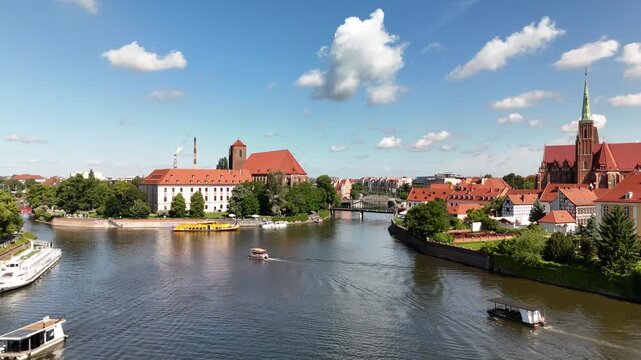 Aerial view of Odra river with historic churches boats and old town panorama in Wrocław Poland