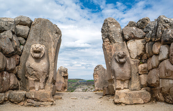 Architectural view of the famous stone-carved Lion Gate at the ancient ruins of Hattusa. The monumental gate represents the master masonry and artistic achievements of the Hittite civilization in Anat