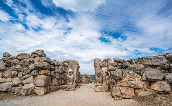 Architectural view of the famous stone-carved Lion Gate at the ancient ruins of Hattusa. The monumental gate represents the master masonry and artistic achievements of the Hittite civilization in Anat