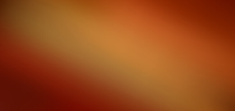 Abstract warm amber sunset glow. Soft orange and burgundy blurred gradient background.