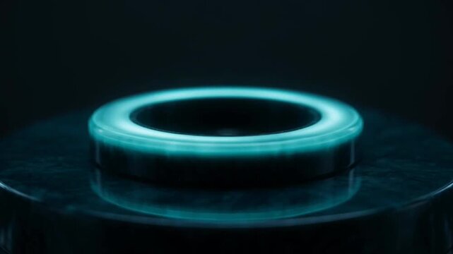 Glowing cyan superconductor ring levitating on dark reflective surface.