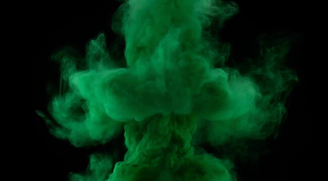 Vibrant Green Smoke Cloud Exploding Against a Black Background with Dramatic Lighting and Wispy Tendrils Ascending