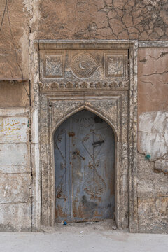 Entrance door in the streets of Mosul, Iraq
