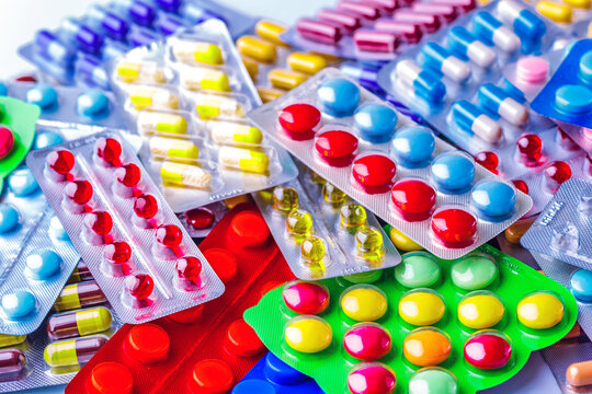 Drug prescription for treatment medication. Pharmaceutical medicament, cure in container for health. Pharmacy theme, capsule pills with medicine antibiotic in packages.