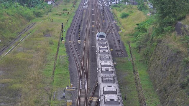 A train that passes directly without stopping at a station