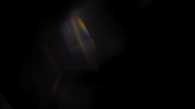 Abstract organic light leaks overlay effect with colorful rainbow reflections and crystal prism aberrations. Perfect for transition, vintage look, and cinematic background.