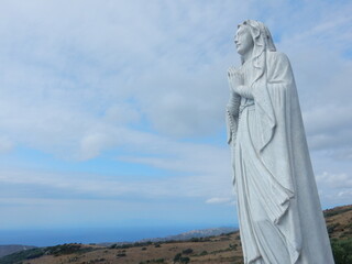 Fototapeta premium The statue of the Virgin Mary in Trinità d'Agultu, Gallura, Sardinia, Italy