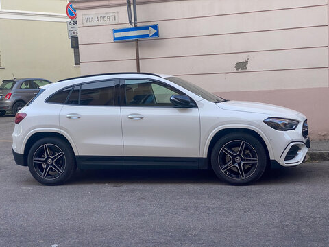 Mercedes Benz GLA SUV parked on a city street, showcasing urban mobility and luxury design