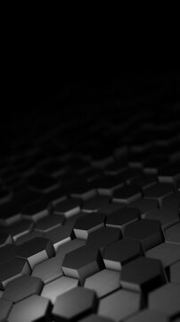 Vertical dark 3D hexagon surface in 4K 60fps loop, black modular depth, soft shadows, and futuristic technology pattern with clean abstract motion visuals.