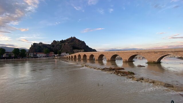 Historic Koyunbaba Bridge spanning the Kızılırmak River in Osmancık, &Ccedil;orum, T&uuml;rkiye. This magnificent 15th-century Ottoman stone arch bridge, built during the reign of Sultan Bayezid II, stands as one