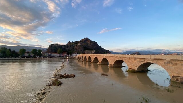 Historic Koyunbaba Bridge spanning the Kızılırmak River in Osmancık, &Ccedil;orum, T&uuml;rkiye. This magnificent 15th-century Ottoman stone arch bridge, built during the reign of Sultan Bayezid II, stands as one