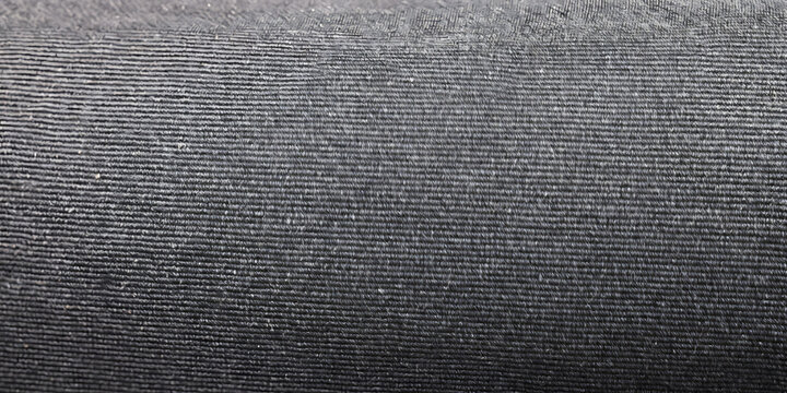 Light gray heather canvas swatch background texture. Seamless fabric material backdrop pattern.