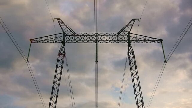 Transmission infrastructure supporting modern energy security and grid reliability. Perfect for utility, policy and sustainability content. Time-lapse video. Part of series.