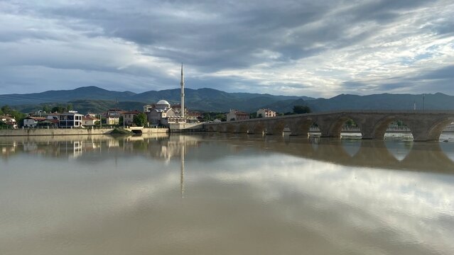 Historic Koyunbaba Bridge spanning the Kızılırmak River in Osmancık, &Ccedil;orum, T&uuml;rkiye. This magnificent 15th-century Ottoman stone arch bridge, built during the reign of Sultan Bayezid II, stands as one