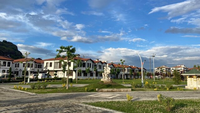 Panoramic view of Osmancık&rsquo;s historic landmarks, including the ancient castle, the iconic Koyunbaba Bridge, and the Kızılırmak River in &Ccedil;orum, T&uuml;rkiye. A remarkable scene showcasing the rich cultural 