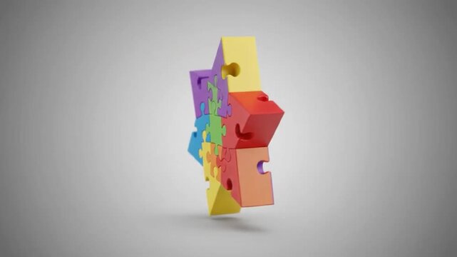 Colorful 3D puzzle pieces forming a star shape on a grey background, representing connection and problem-solving.