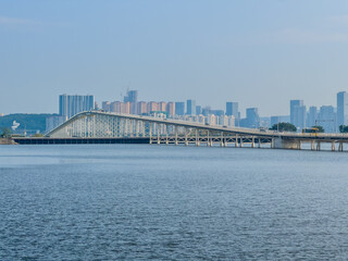 Fototapeta premium Bridge crossing over water way in Macau China 