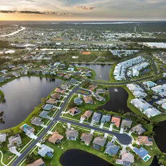 Aerial view of expensive residential houses in small town in southwest Florida. American dream homes as example of real estate development in US suburbs © bilanol