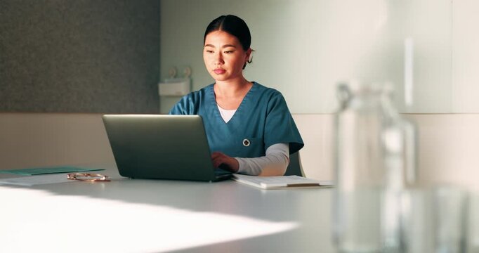 Laptop, nurse and Asian woman with paperwork in office, hospital admin and typing surgery schedule. Medical system, operation timetable and theater resident with pc for planning, review and research