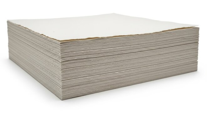 A thick stack of uncoated art paper sheets, presented in a neutral, clean studio setting