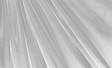 Obraz premium Metallic Satin Fabric Texture Overlay Abstract Luxury Background with Soft Reflective Waves and Wrinkled Grunge Surface - Ideal for Vintage Effects, Photo Blending and Creative Design