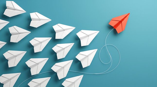 Leadership and innovation concept featuring a red paper airplane leading white ones, symbolizing strategic business differentiation and success.